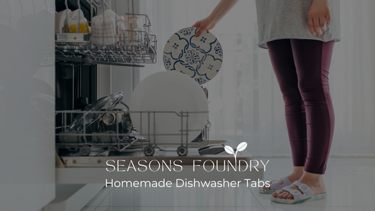 a woman putting dishes in a dishwasher